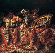 Jacques Hupin, A still life of peaches, grapes and pomegranates in a pewter bowl, an ornate ormolu plate and ewers, all resting on a table draped with a carpet